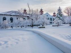 College Hall and surrounding campus area blanketed in snow.